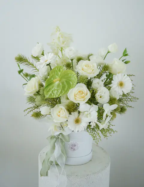 White rose and orchid bouquet